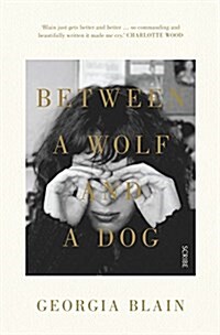 Between a Wolf and a Dog (Paperback)