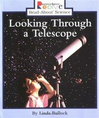 Looking through a telescope 