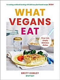 What Vegans Eat : A Cookbook for Everyone with Over 100 Delicious Recipes. Recommended by Veganuary (Hardcover)