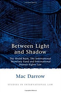 Between Light and Shadow : The World Bank, the International Monetary Fund and International Human Rights Law (Paperback)
