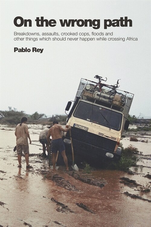 On the Wrong Path: Breakdowns, assaults, crooked cops, floods and other things which should never happen while crossing Africa (Paperback)