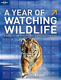 A Year of Watching Wildlife: A Guide to the Worlds Best Animal Encounters (Paperback)