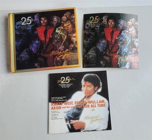 [중고] [수입] Michael Jackson - Thriller [25th Anniversary Edition] (CD+DVD) Deluxe Version (Casebound/Pozzoli Book)