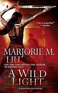 A Wild Light: A Hunter Kiss Novel (Mass Market Paperback)