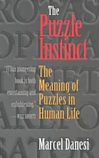 The Puzzle Instinct: The Meaning of Puzzles in Human Life (Paperback)
