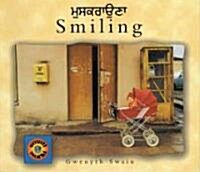 Smiling (English–Punjabi) (Paperback)