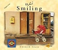 Smiling (English–Urdu) (Paperback)