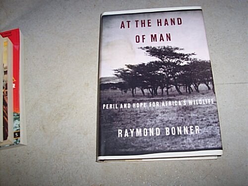 At The Hand Of Man: Peril and Hope for Africas Wildlife (Hardcover, 1st)