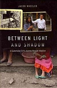 Between Light and Shadow: A Guatemalan Girls Journey Through Adoption (Hardcover)
