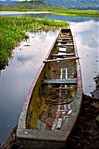 A Canoe at Rivers Edge in Panama Journal: 150 Page Lined Notebook/Diary (Paperback)